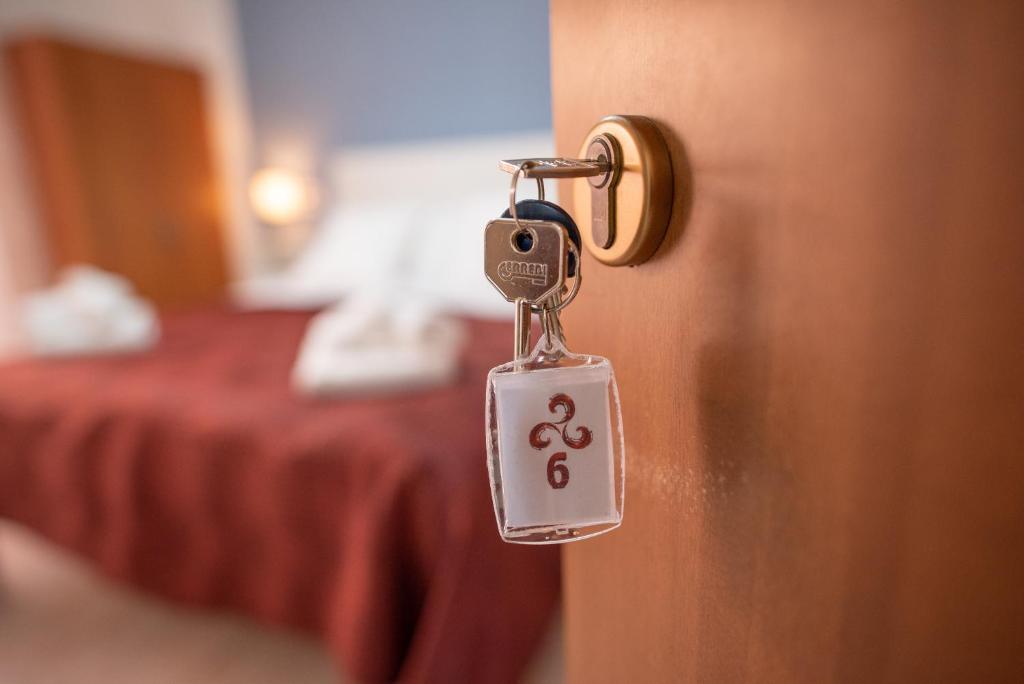 Postel nebo postele na pokoji v ubytování B&B New Triscele
