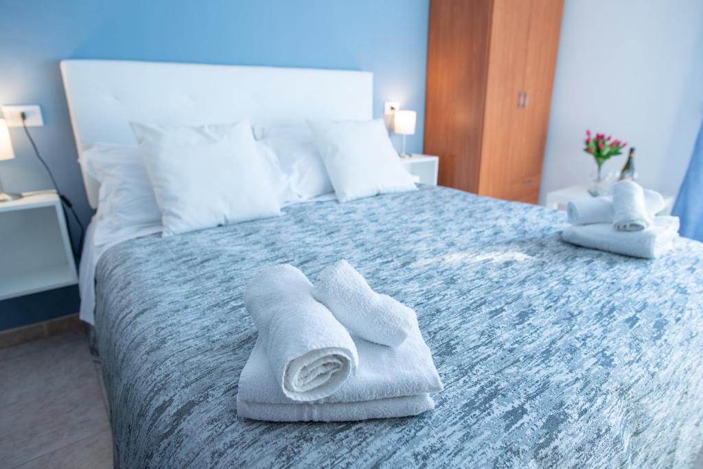 Postel nebo postele na pokoji v ubytování B&B New Triscele