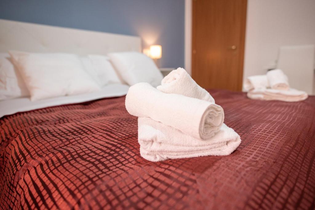 Postel nebo postele na pokoji v ubytování B&B New Triscele