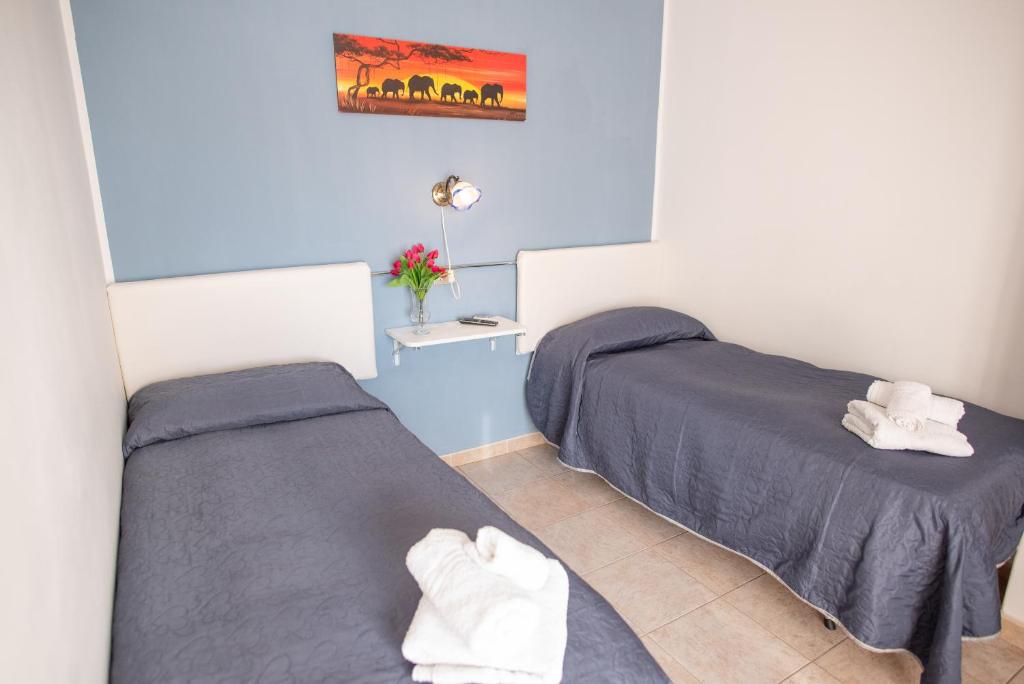Postel nebo postele na pokoji v ubytování B&B New Triscele