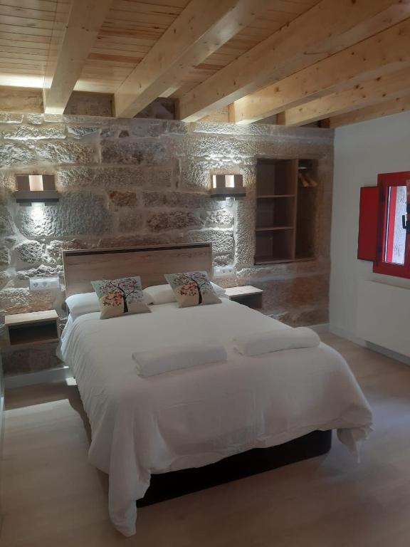 Postel nebo postele na pokoji v ubytování Casa Choupas