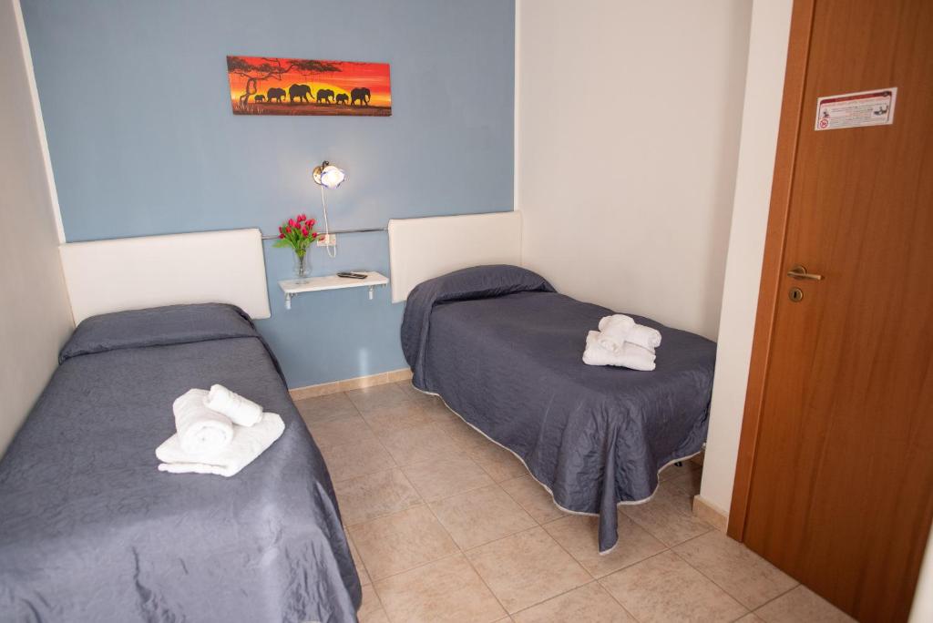 Postel nebo postele na pokoji v ubytování B&B New Triscele