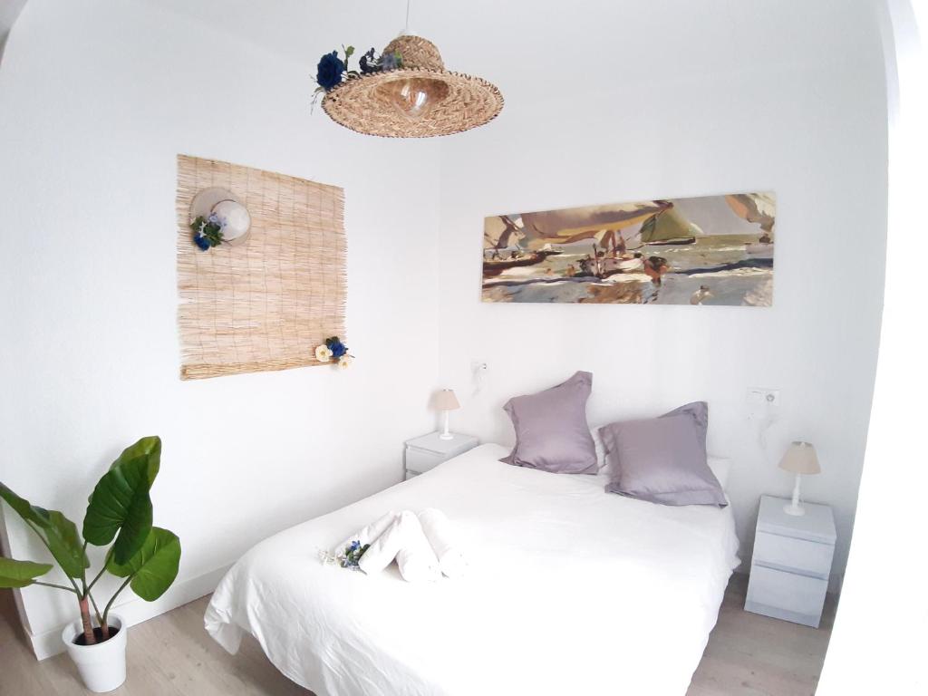 Postel nebo postele na pokoji v ubytování Ananda Beach Rooms