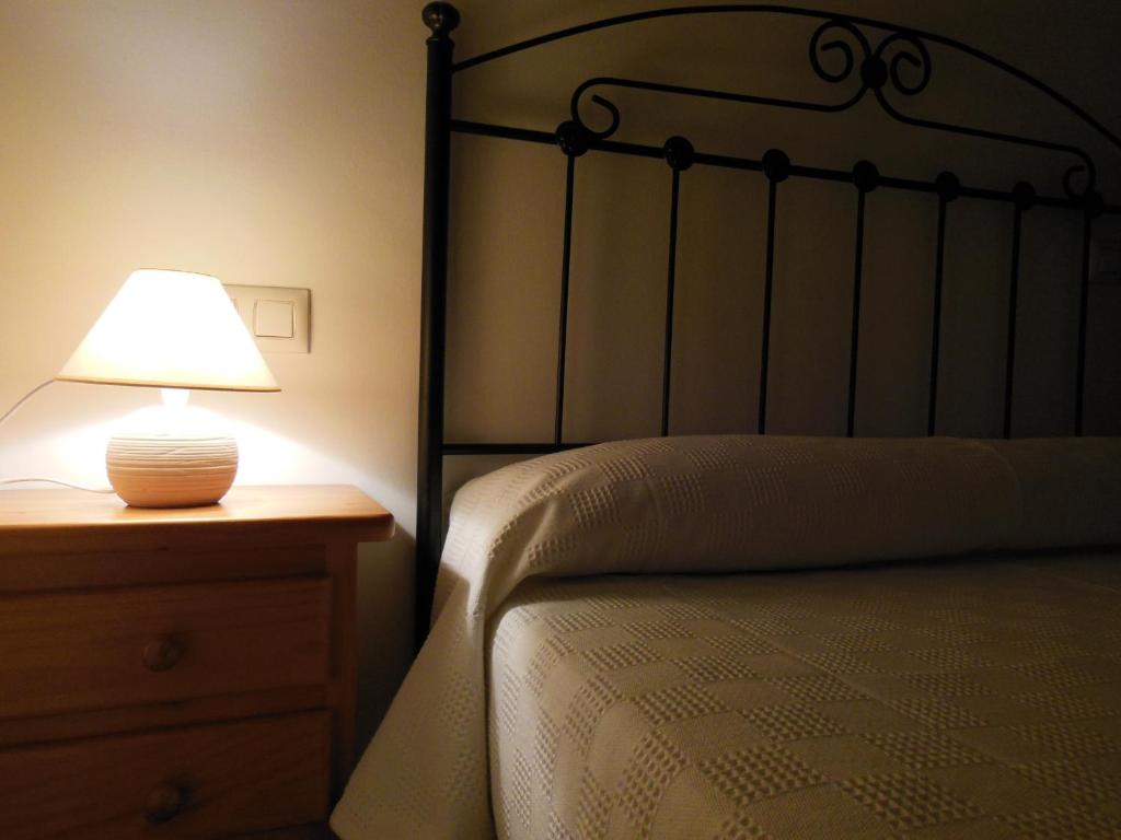 Łóżko lub łóżka w pokoju w obiekcie Apartamento Avenida del Parque