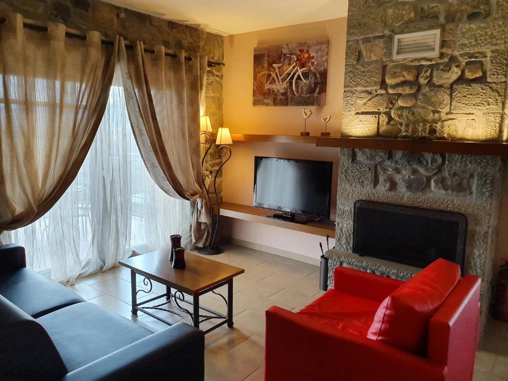 TV a/nebo společenská místnost v ubytování The View Village - Villas Suites & Spa