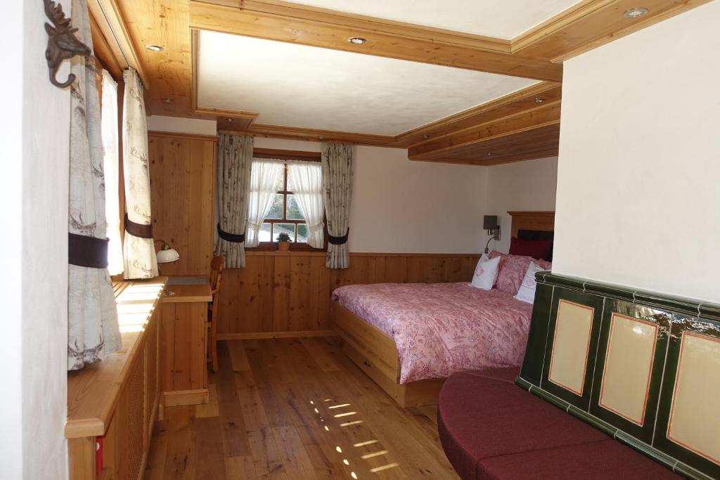 Postel nebo postele na pokoji v ubytování Hollhouse - Bed & Breakfast