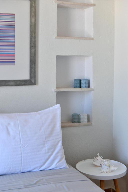 Postel nebo postele na pokoji v ubytování ALMYRA SeaView Maisonette in Naousa