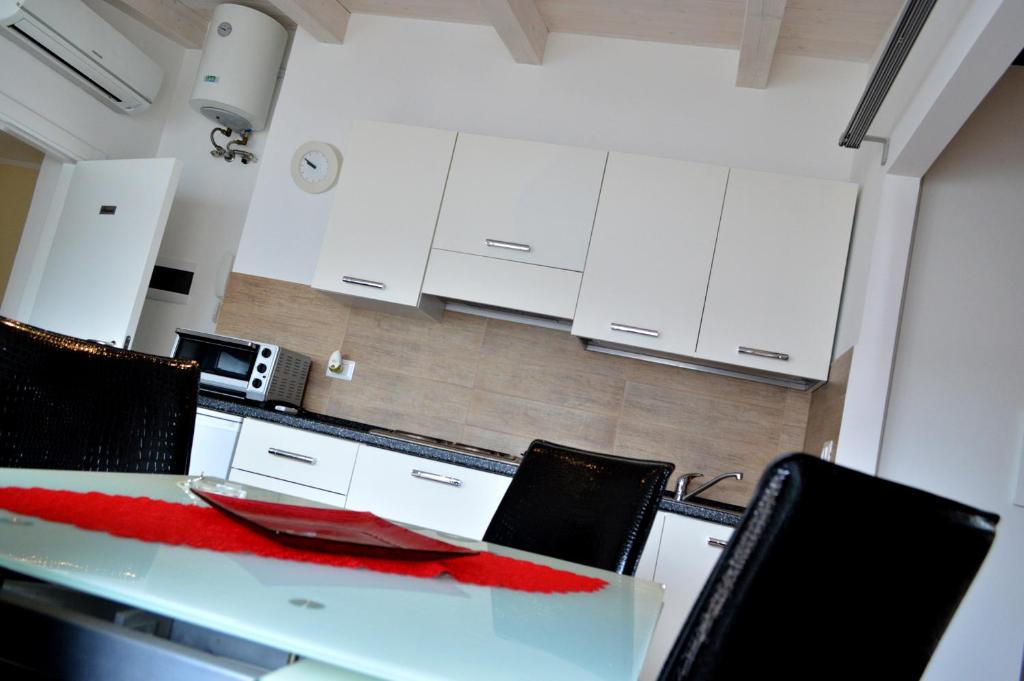 Kuchyň nebo kuchyňský kout v ubytování Albergo Diffuso Dimora Rossi B&B