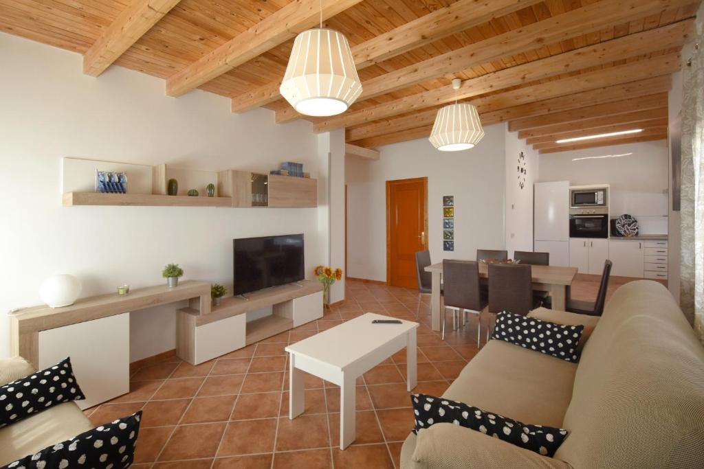 A television and/or entertainment centre at Las Casas de Pecheye