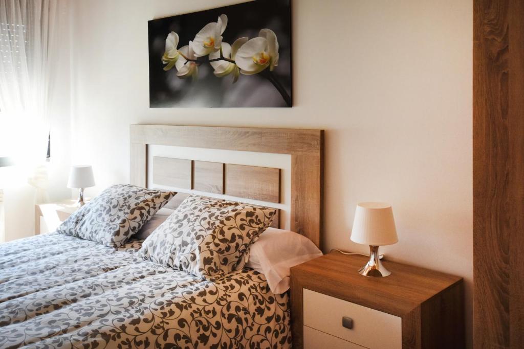 A bed or beds in a room at Las Casas de Pecheye