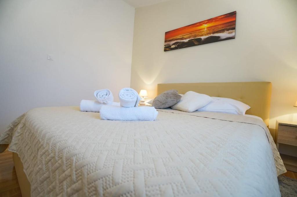Posteľ alebo postele v izbe v ubytovaní Apartment Nicol
