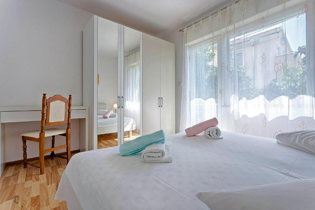 Postel nebo postele na pokoji v ubytování Ani in Trogir * Mittel-Dalmatien