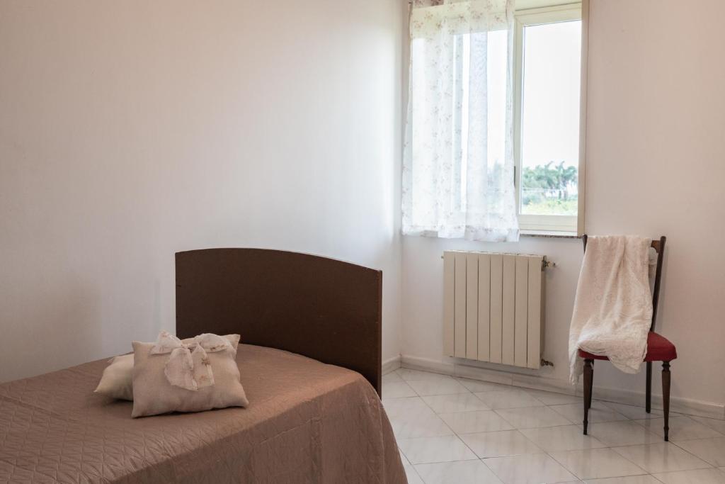 Posteľ alebo postele v izbe v ubytovaní Casa Rosario