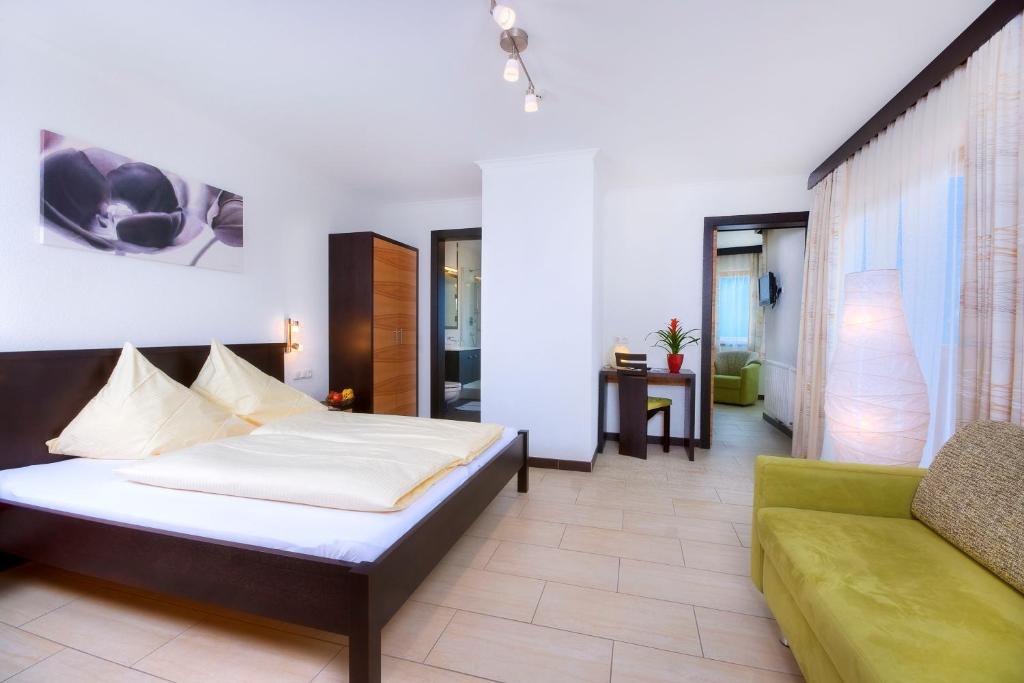Postel nebo postele na pokoji v ubytování Panoramahotel Burgeck