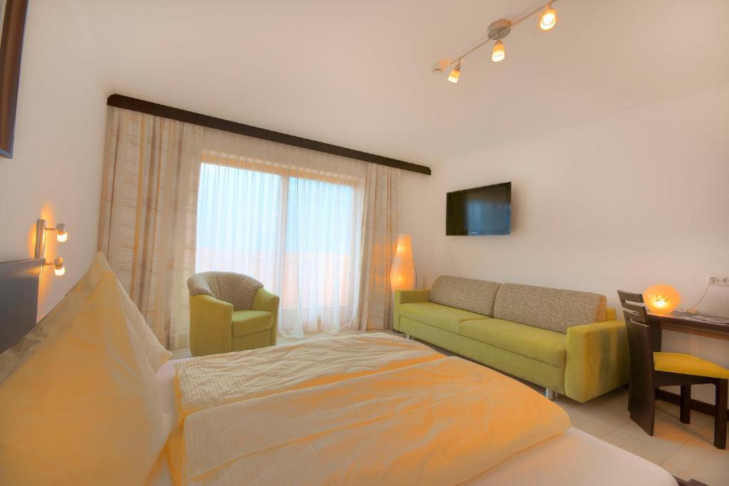 Postel nebo postele na pokoji v ubytování Panoramahotel Burgeck