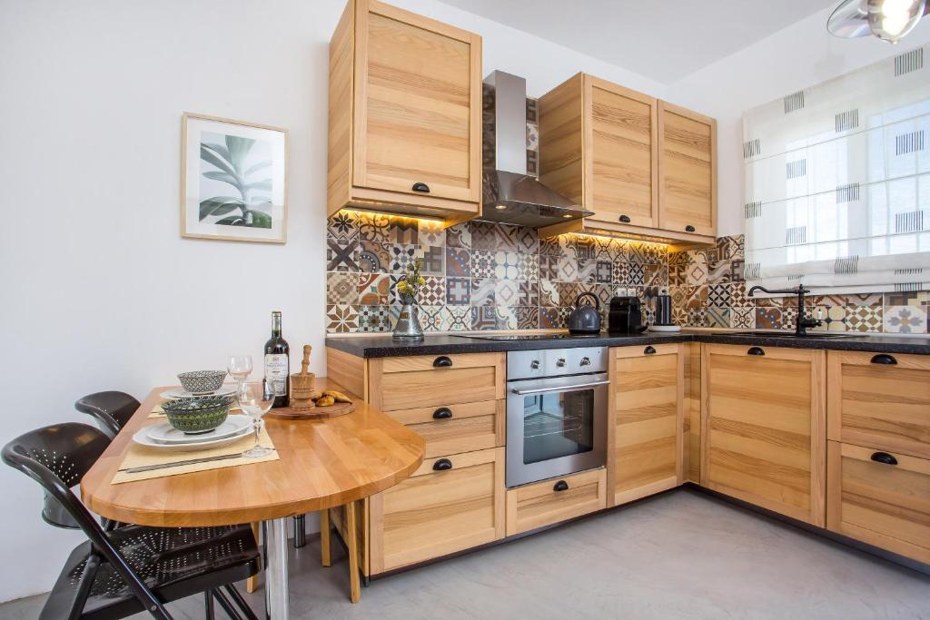 Kuchyň nebo kuchyňský kout v ubytování Euphoria Luxury apartment