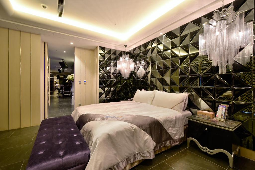 Katil atau katil-katil dalam bilik di U-Her Hotel