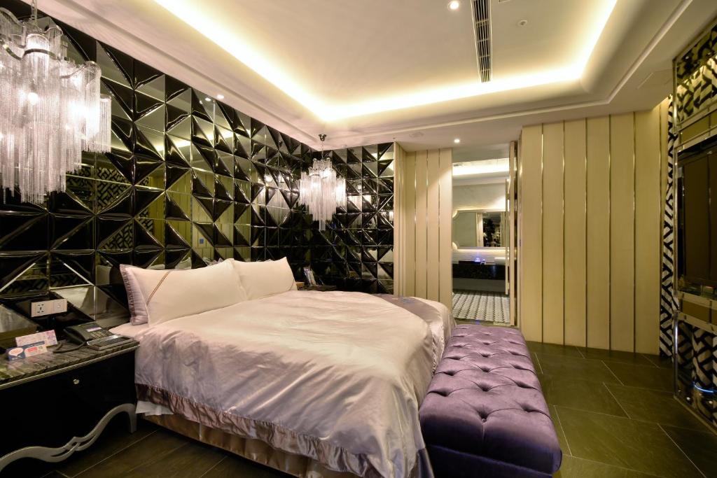Katil atau katil-katil dalam bilik di U-Her Hotel