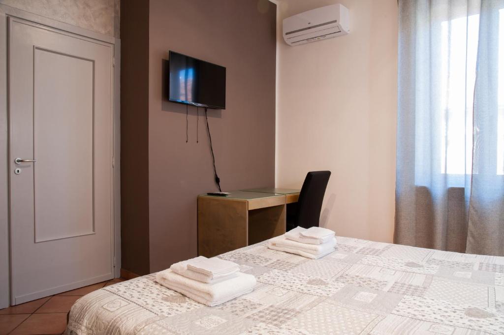 Postel nebo postele na pokoji v ubytování La Corte