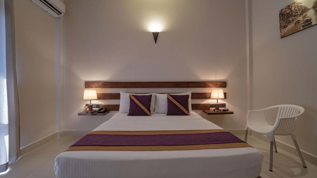 Postel nebo postele na pokoji v ubytování Hive 68 - Hotel and Resorts (Negombo)