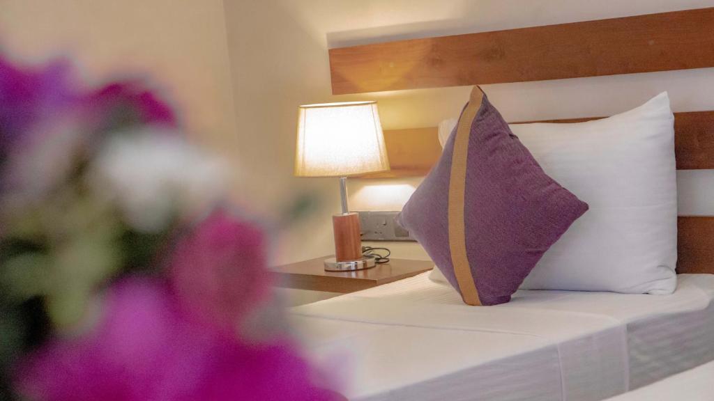 Postel nebo postele na pokoji v ubytování Hive 68 - Hotel and Resorts (Negombo)