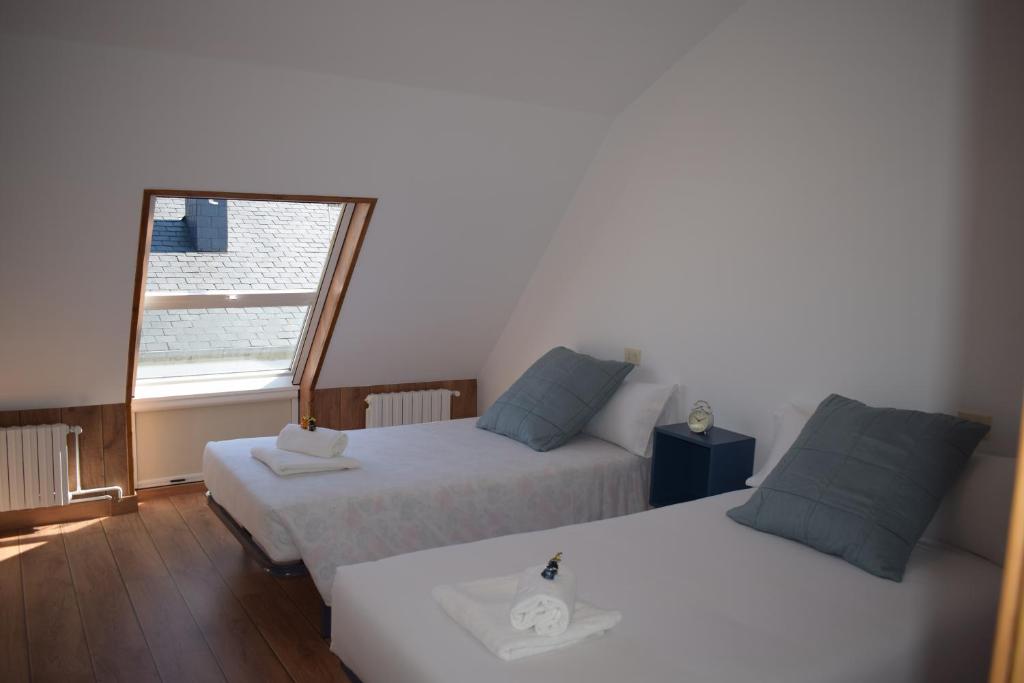 Postel nebo postele na pokoji v ubytování La Casa de Manuel