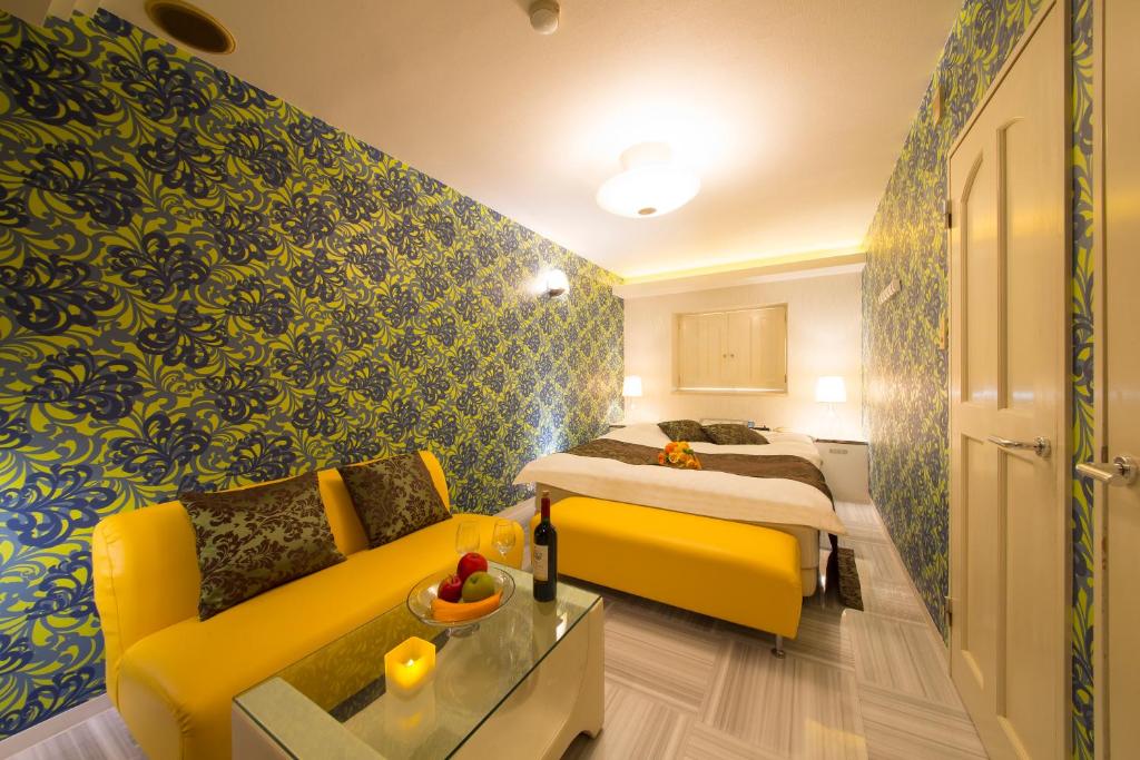 Postel nebo postele na pokoji v ubytování Hotel GT Kansai International Airport (Adult Only)
