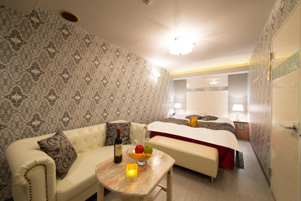 Postel nebo postele na pokoji v ubytování Hotel GT Kansai International Airport (Adult Only)