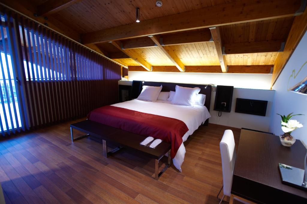 Postel nebo postele na pokoji v ubytování Hotel Eguren Ugarte