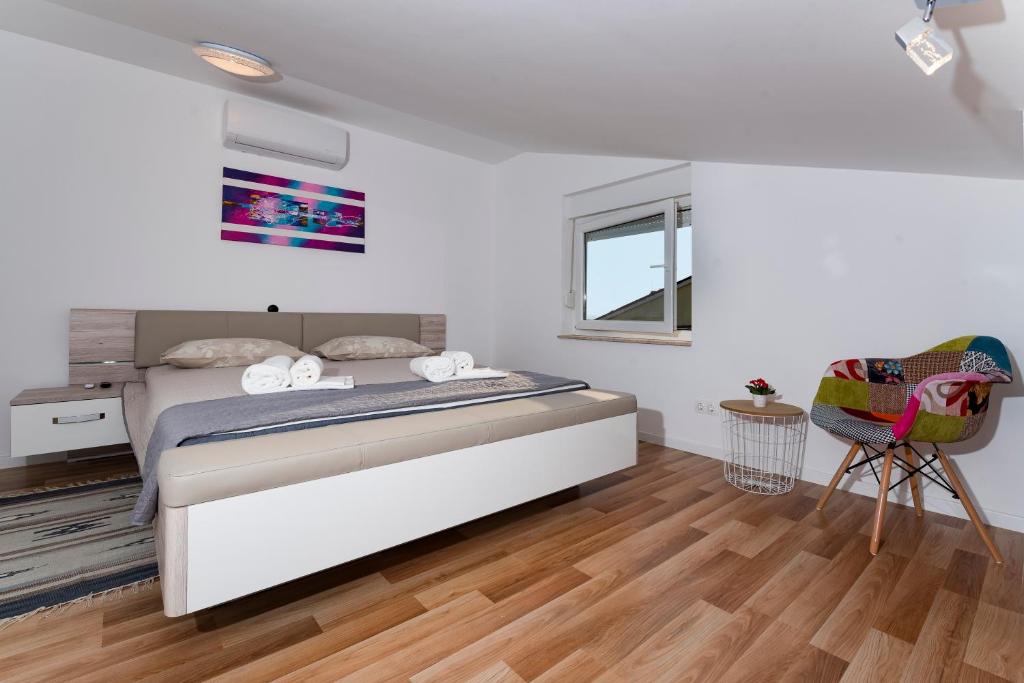 Posteľ alebo postele v izbe v ubytovaní Apartment AleMar