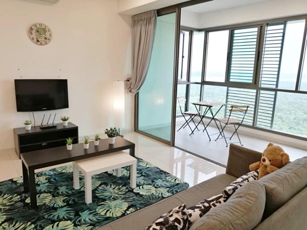 TV a/nebo společenská místnost v ubytování Iskandar Residences 3 Bedroom