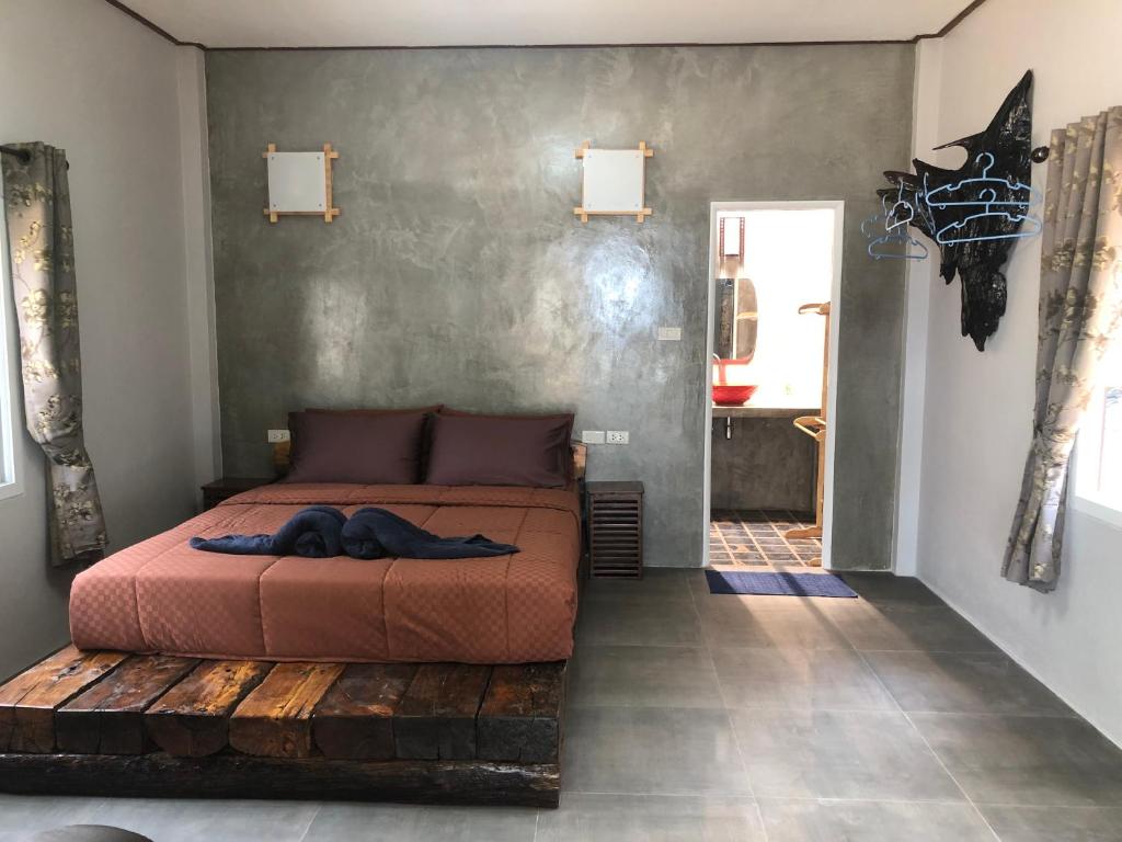 Postel nebo postele na pokoji v ubytování Rim Lay