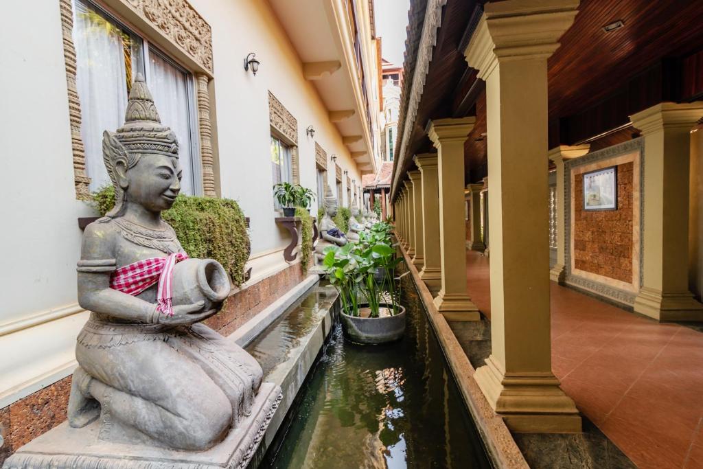 Posezení v ubytování Empress Angkor Resort & Spa