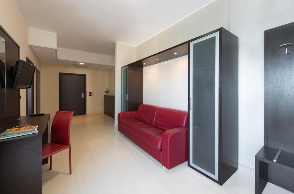 TV a/nebo společenská místnost v ubytování Grand Hotel Adriatico