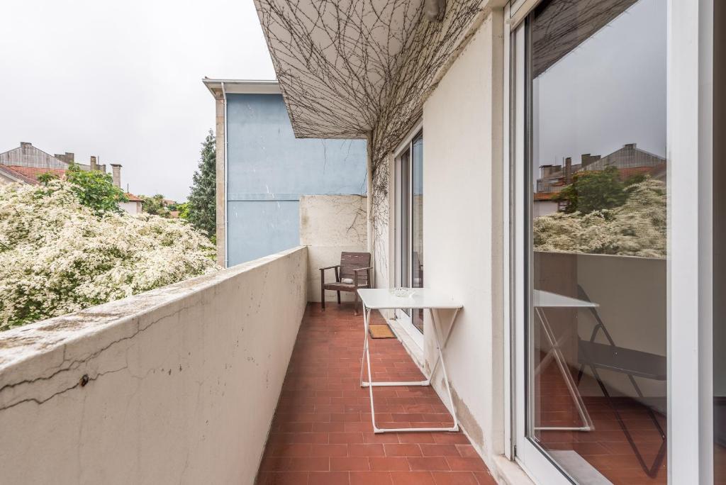 Ein Balkon oder eine Terrasse in der Unterkunft GuestReady - Over the Rooftop - Balcony