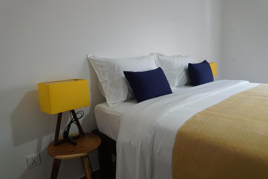 Postel nebo postele na pokoji v ubytování ANGKOR DINO B&B