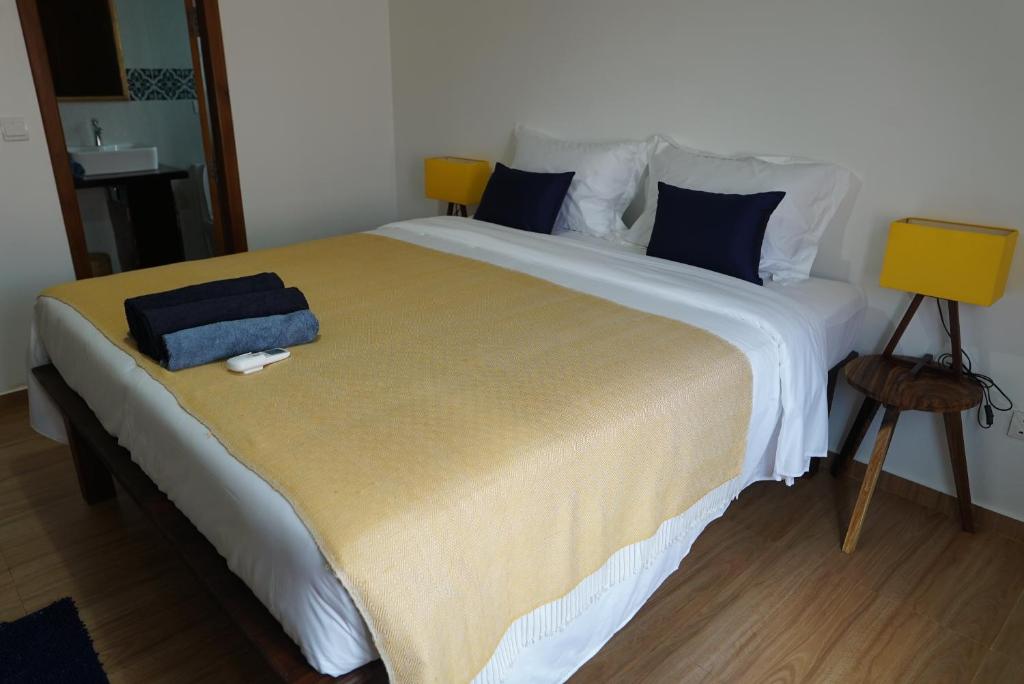 Postel nebo postele na pokoji v ubytování ANGKOR DINO B&B