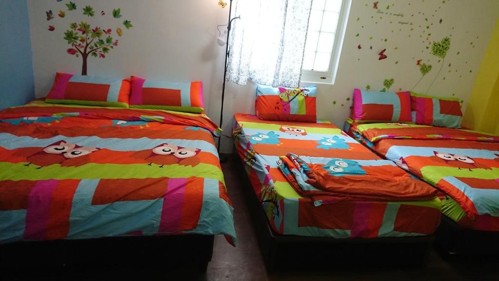 Postel nebo postele na pokoji v ubytování Haven Seaview Homestay