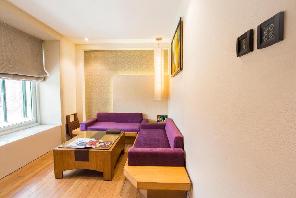 Uma área de estar em Hotel Bawa Continental