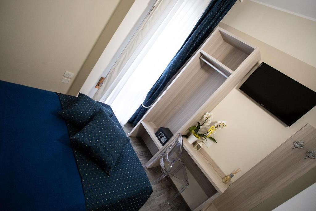 TV a/nebo společenská místnost v ubytování HOME HOTEL