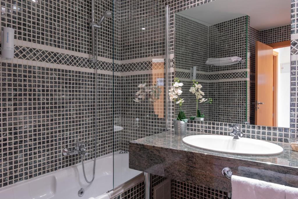 Koupelna v ubytování Hotel Real