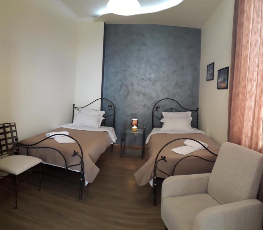 Postel nebo postele na pokoji v ubytování Omsi House