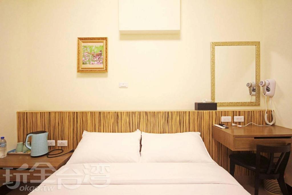 Letto o letti in una camera di Plum Green Homestay