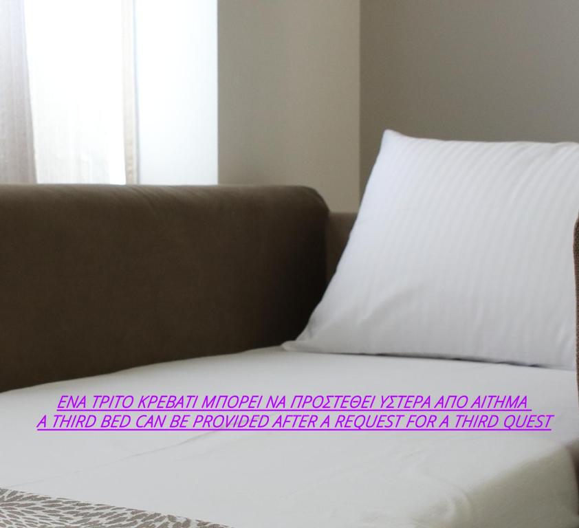 Posteľ alebo postele v izbe v ubytovaní Aiolos Apartments Suites Ermou 64 Monastiraki Plaka 2nd Floor