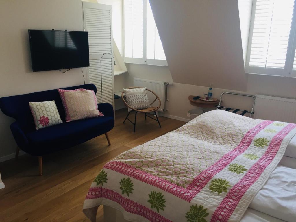 Postel nebo postele na pokoji v ubytování das HOTEL in München