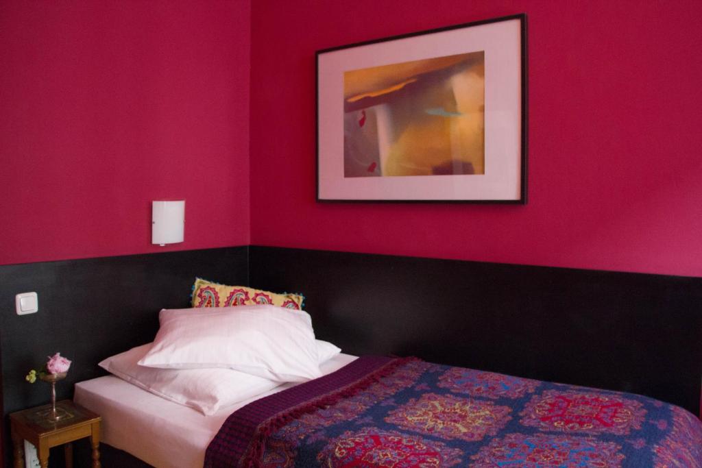 Postel nebo postele na pokoji v ubytování das HOTEL in München