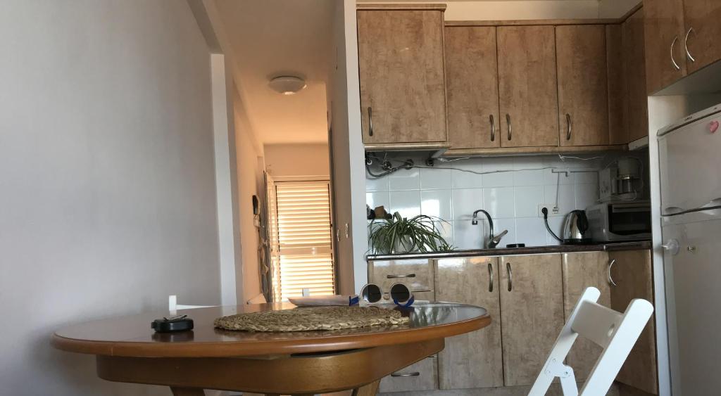 Kuchyň nebo kuchyňský kout v ubytování Una ventana al mar