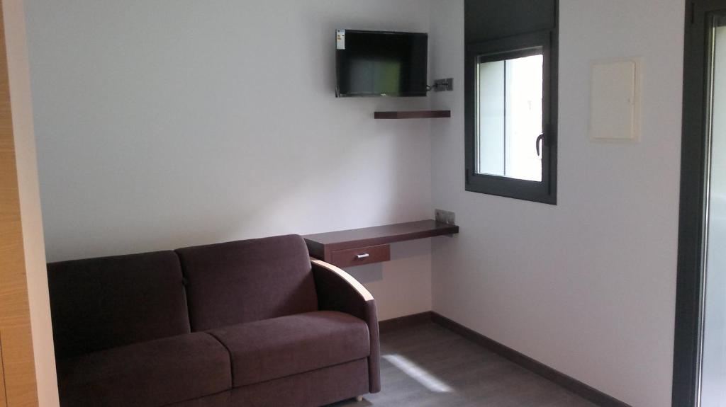 TV a/nebo společenská místnost v ubytování Hotel 9 Sant Antoni
