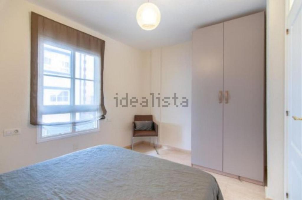Postel nebo postele na pokoji v ubytování Two bedroom duplex with spectacular ocean view in Costa Adeje