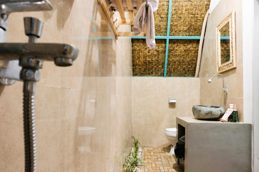 Koupelna v ubytování Makarma Resort Lombok